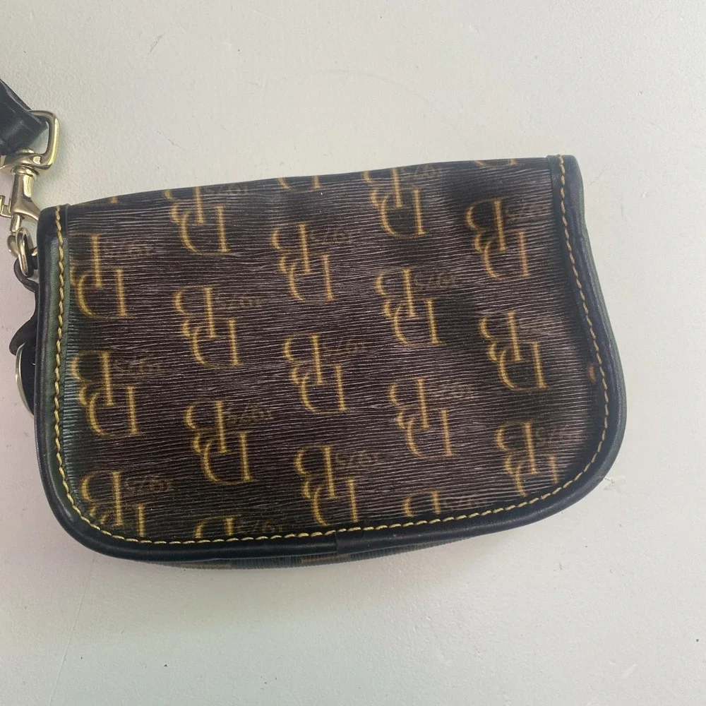 Dooney & Bourke Vintage 1975 Signature Logo Navy Gold Logo Snap Flap Wristlet